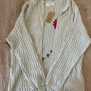 Cable Knit Sweater with Floral Detail